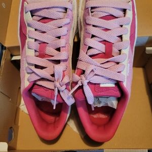 Multi pink suede pumas